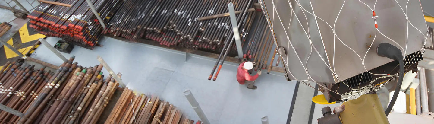 Dropsafe Net with Trisafe™ Carabiner and RFID Choke Plate fully enclosing an overhead fixture.