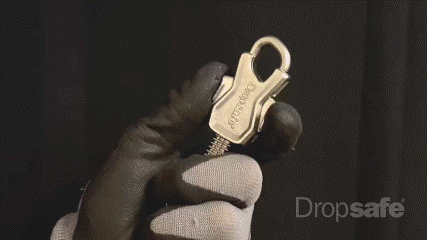 Trisafe Carabiner opened by one hand in glove.