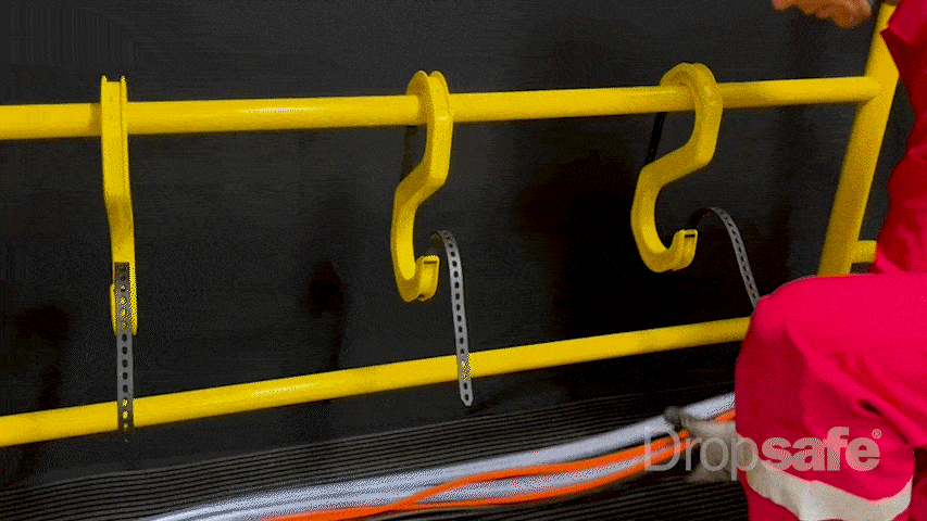 Yellow metal bike rack with curved hooks and silver straps, pack of 10