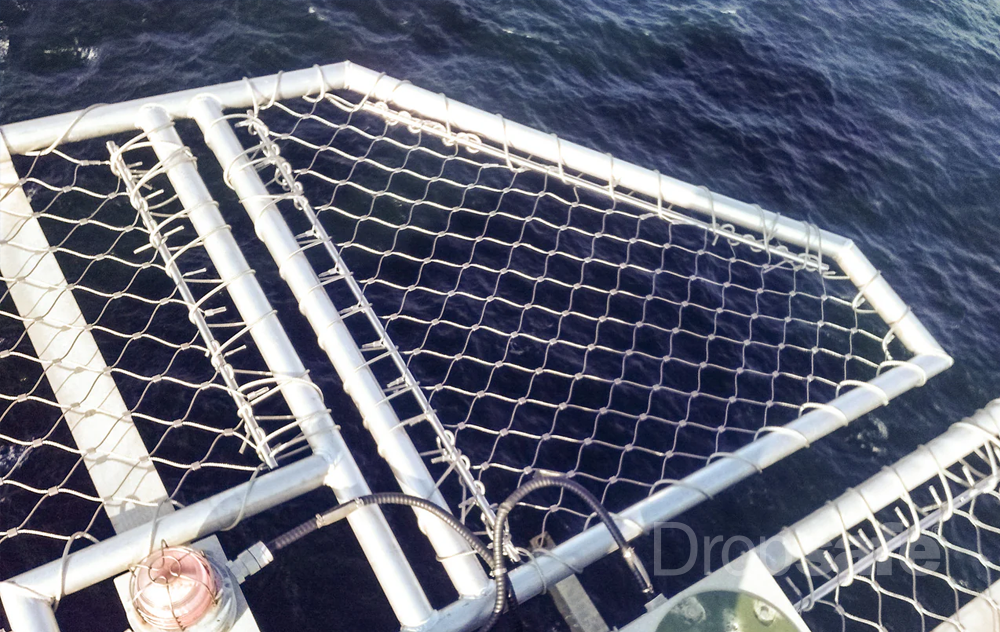 Dropsafe Helideck Perimeter Safety Net on dark blue water