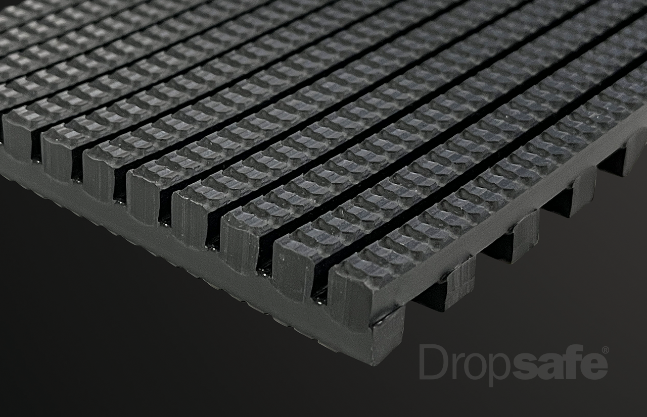 Dropsafe Matting black rubber mat with textured ribbed surface and interlocking edges