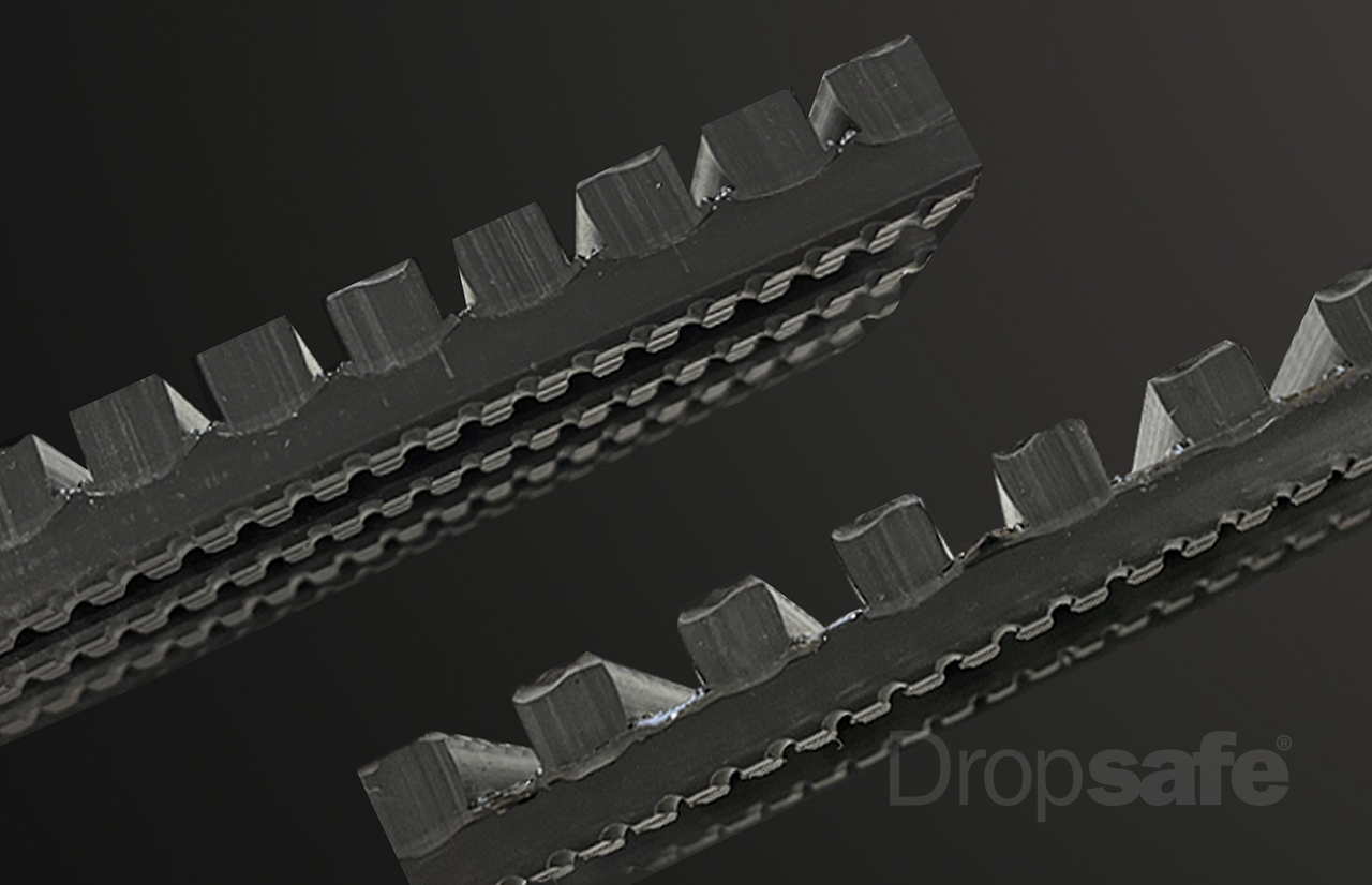 Black rubber timing belt with raised rectangular teeth for Dropsafe Matting