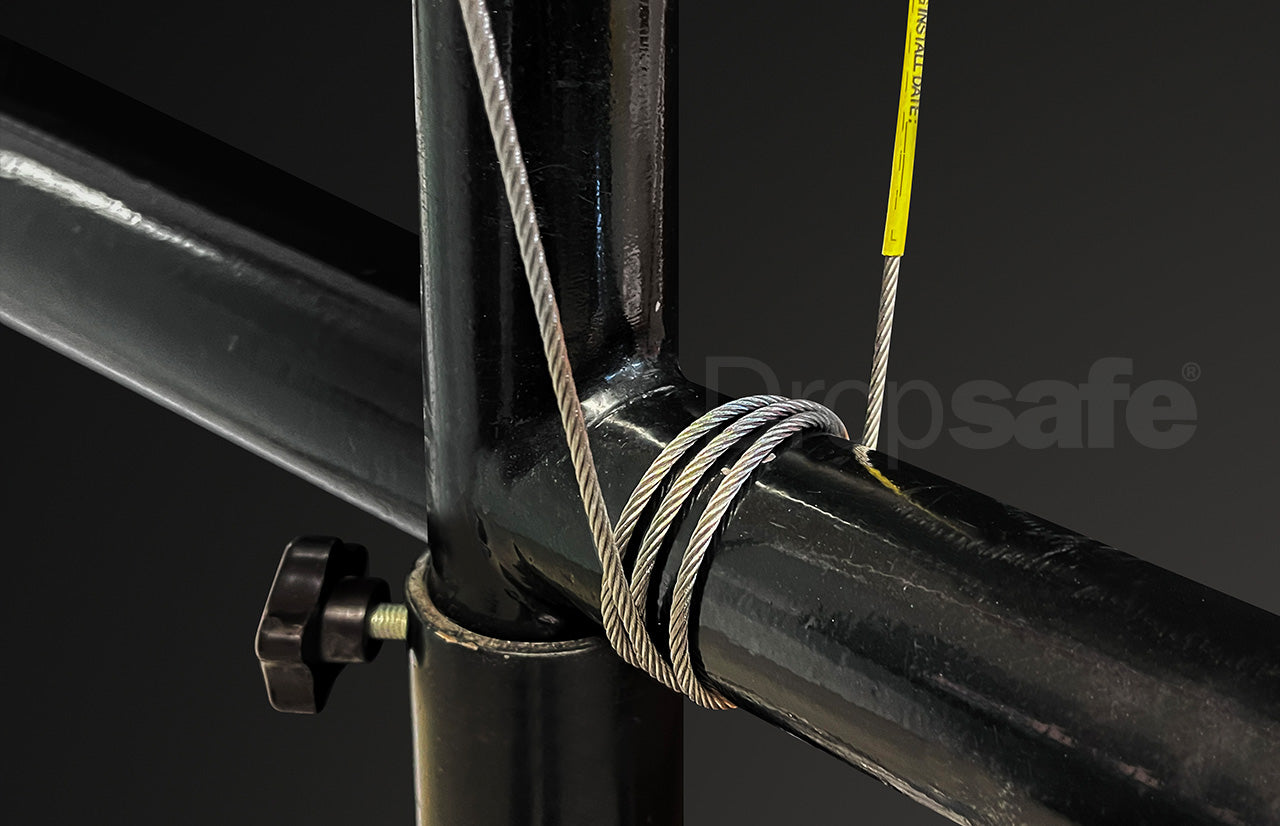 Black metal scaffold pipe secured by coiled stainless steel cable sling with carabiner, 1200mm, SWL 10kg