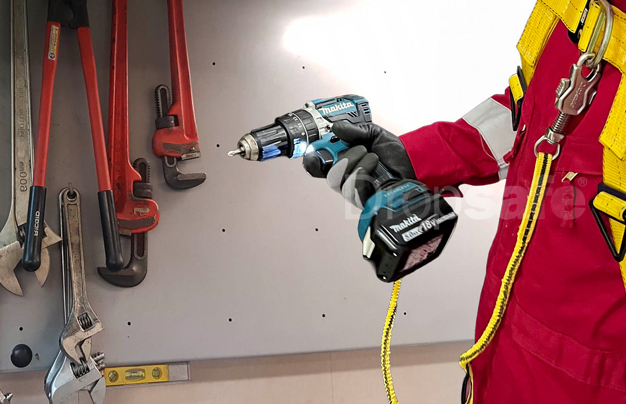 Blue and black cordless drill held in work glove for Dropsafe Tool Tethering