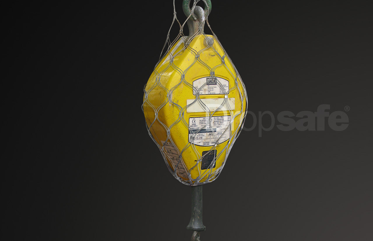 Stainless steel cable netting securing flood light.