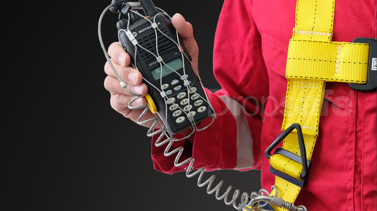 Black radio in silver mesh case with coiled cable and carabiner in Dropsafe Pouches.
