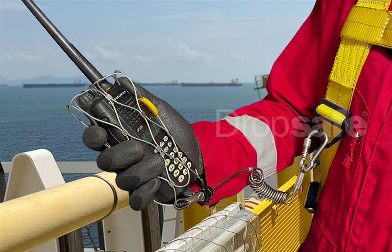 Black radio in silver mesh case with coiled cable and carabiner in Dropsafe Pouches