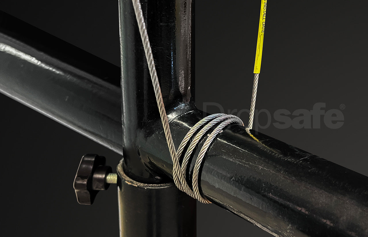 Black metal scaffold pipe secured by coiled stainless steel cable sling with carabiner, 1200mm, SWL 10kg