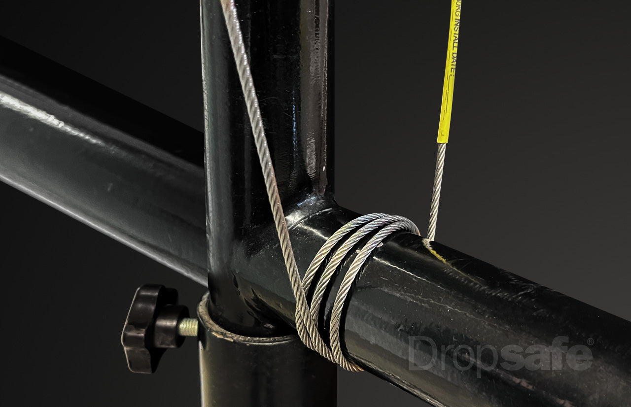 Black metal scaffold pipe secured by coiled stainless steel cable sling with carabiner, 1200mm, SWL 10kg