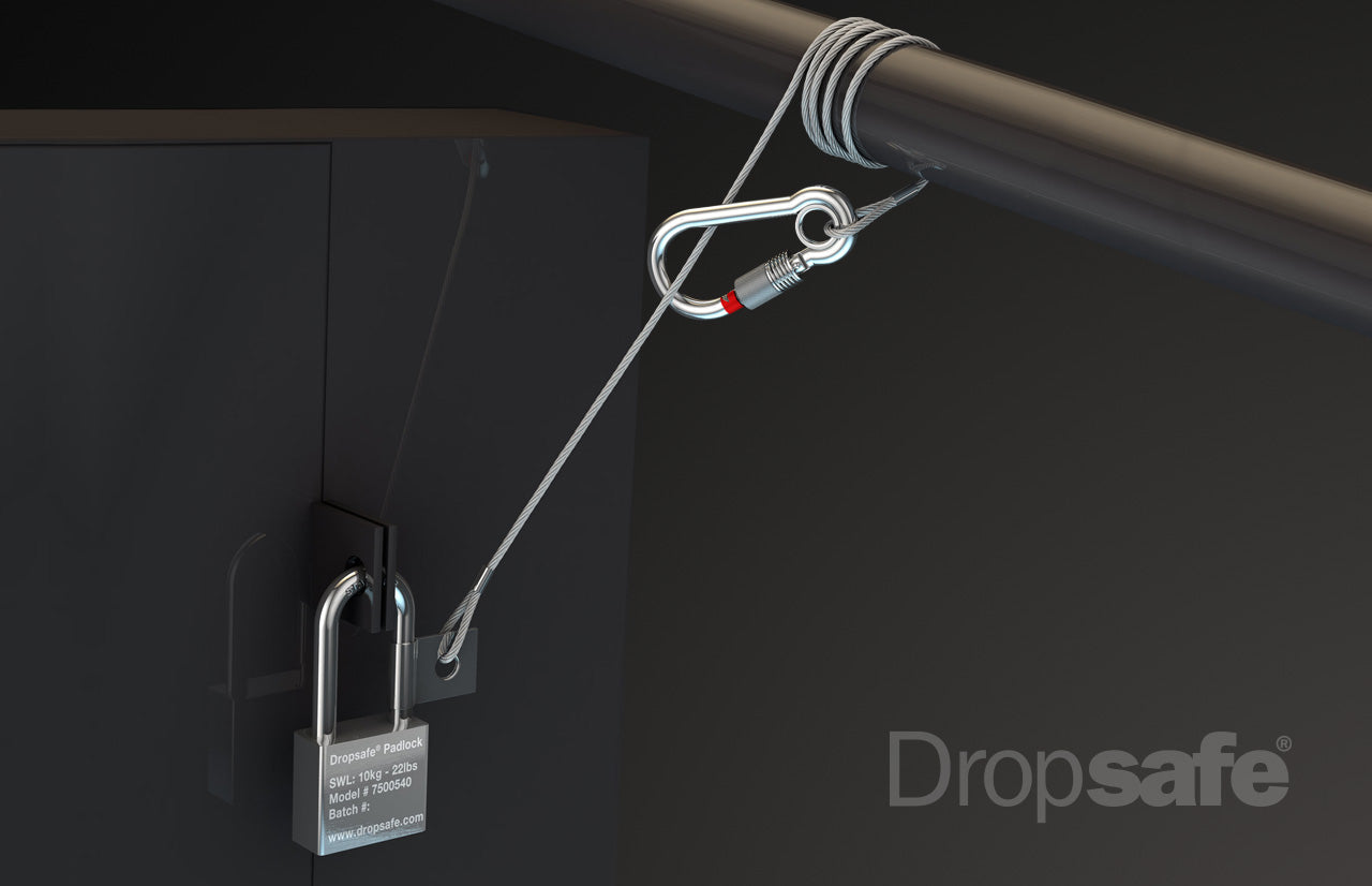 Silver steel cable with carabiner, red accent, and padlock on dark cabinet, 1000mm SWL 80kg